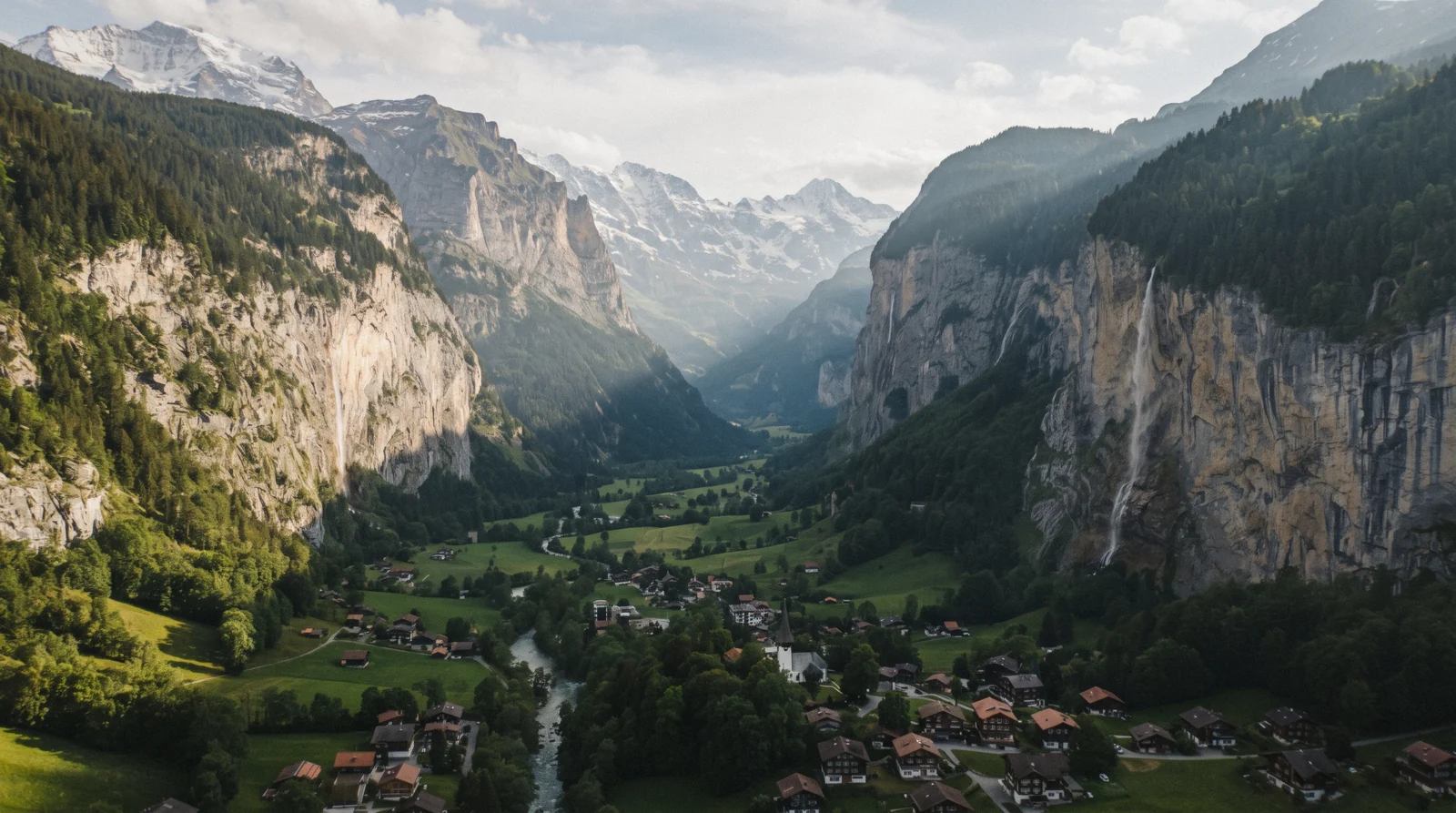An aerial view down the Lauterbrunnen valley showing the cliffs and the villages, the area covered by this Lauterbrunnen map, Switzerland