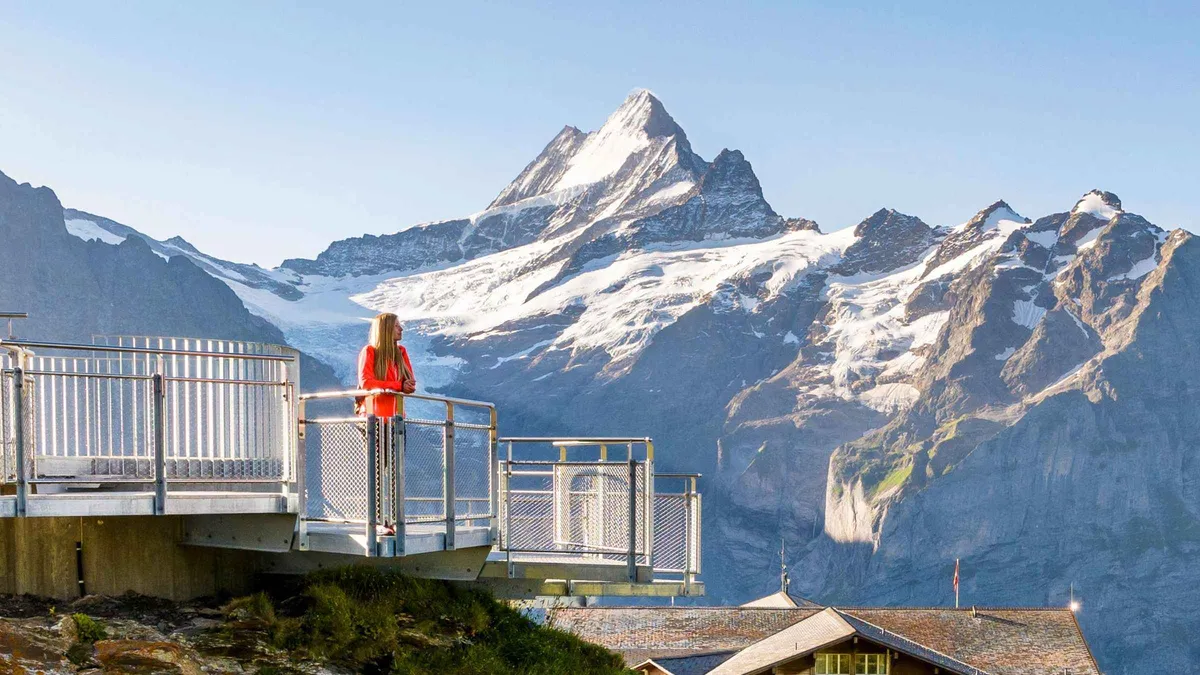 Gondola cable car climbing to Mount First above Grindelwald near the Lauterbrunnen valley