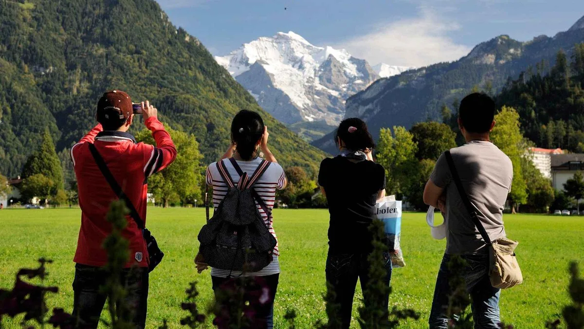 Tour coach stopped in Lauterbrunnen valley on a day trip from Lucerne
