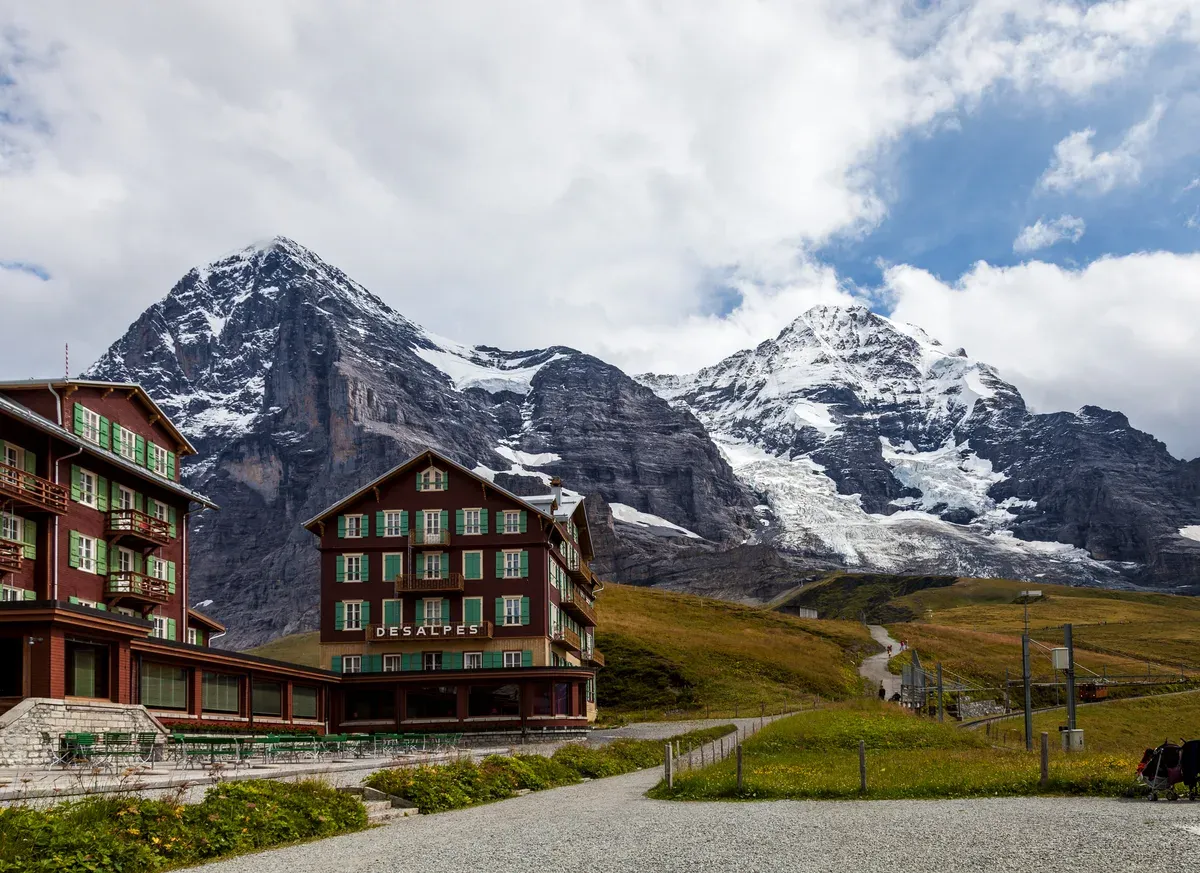 The historic Hotel Bellevue des Alpes at Kleine Scheidegg with the Eiger and Mönch rising directly behind, Switzerland