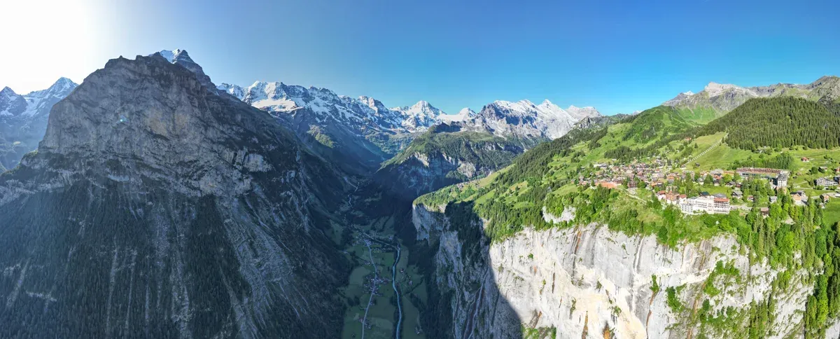 Mürren village perched on its cliff-edge ledge above the Lauterbrunnen valley, Switzerland
