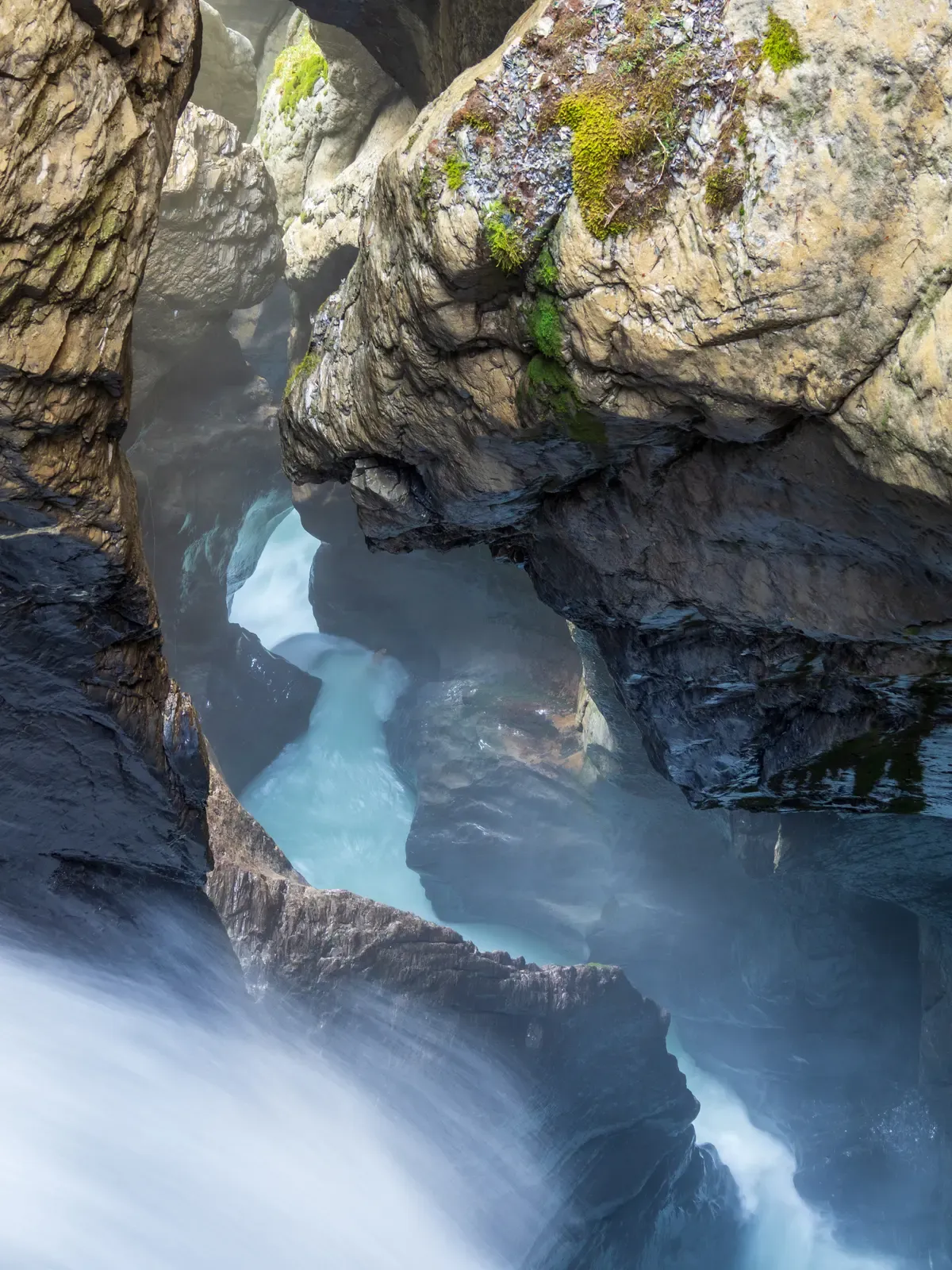 Glacier meltwater cutting through the rock inside Trümmelbach Falls in the Lauterbrunnen valley, Switzerland